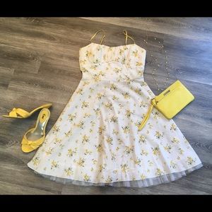 Juniors white sundress with yellow flower pattern
